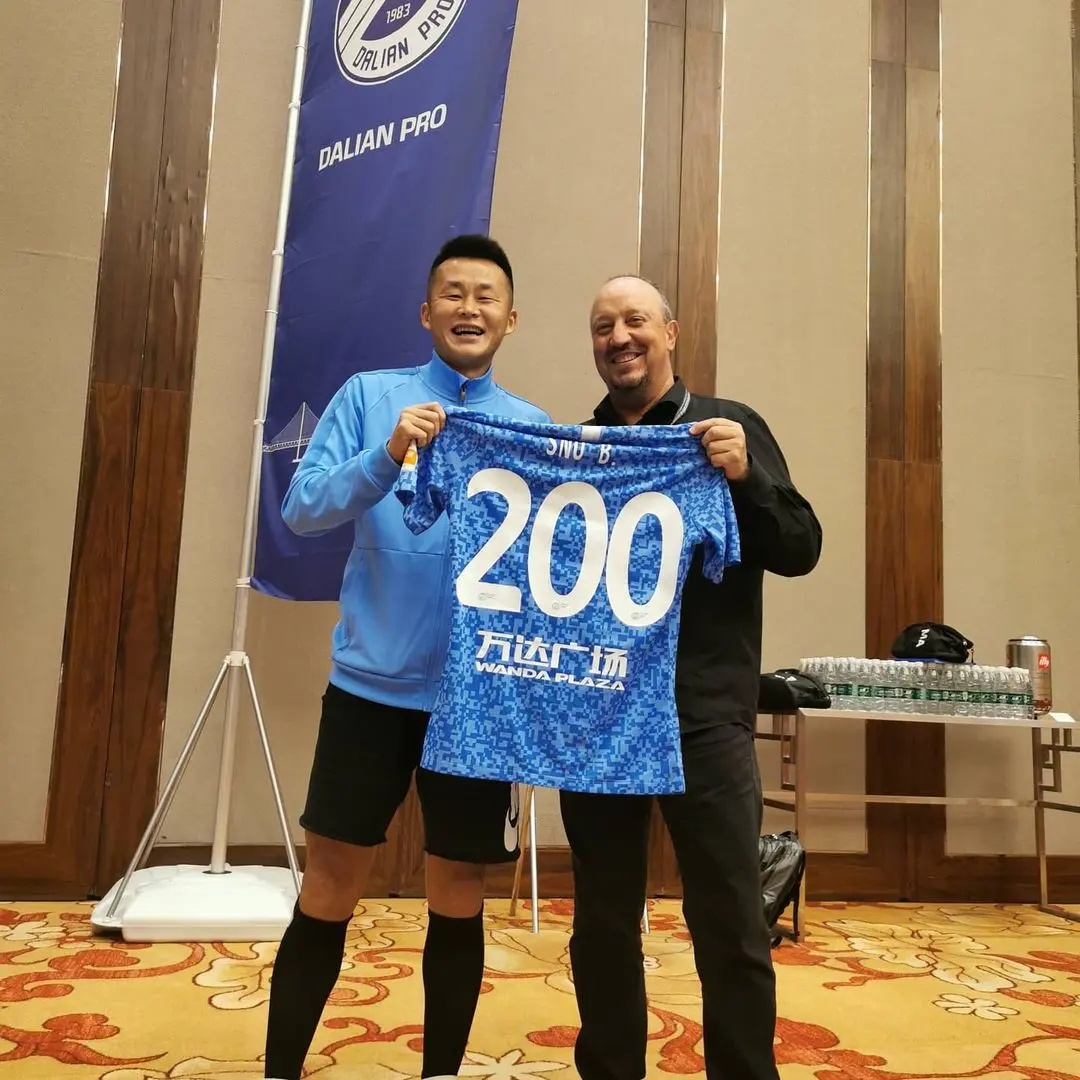 Sun Bo y Rafael Benítez