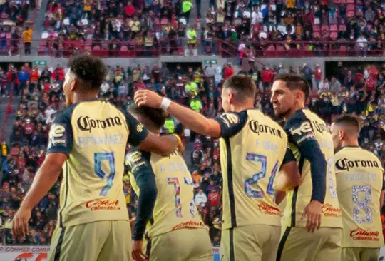 América festeja el triunfo ante Xolos.