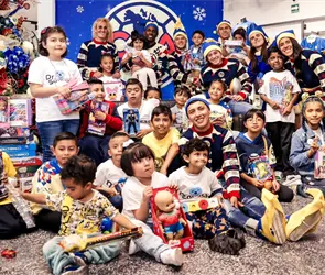 Am&eacute;rica: Qui&ntilde;ones y otras figuras del equipo se disfrazan de Santa Claus para ni&ntilde;os
