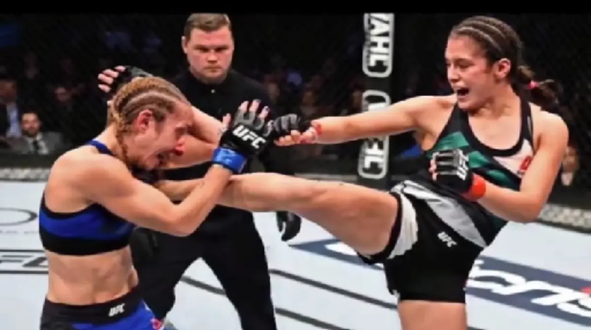 La jalisciense se subió al ring para ganar su primer cinturón contra la ucraniana Valentina Shevchenko el 4 de marzo del 2023, y luego de la sumisión de su rival, se coronó después de un enfrentamiento de cuatro rounds. 