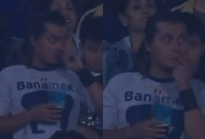 Un aficionado de Pumas fue captado comi&eacute;ndose los mocos.